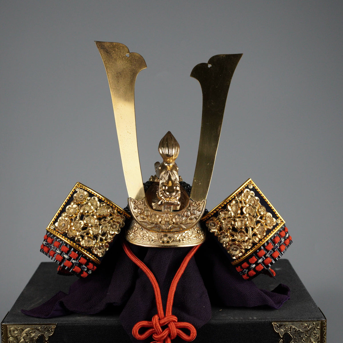 Kabuto helmet display piece, crest and laced neck guard detail