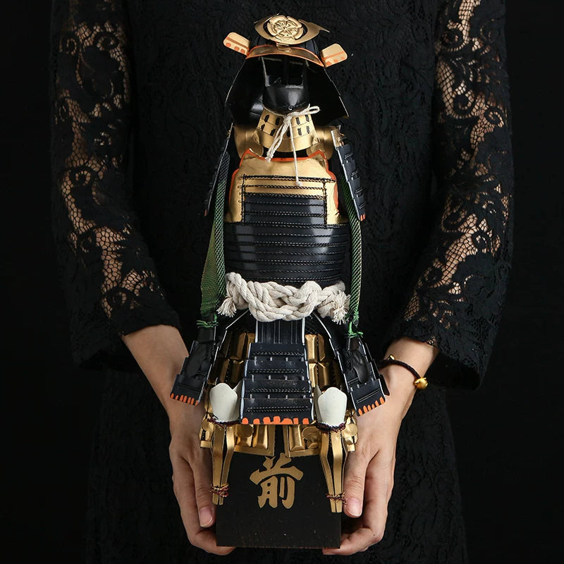 Scaled samurai armor figure on wooden stand, three-quarter view
